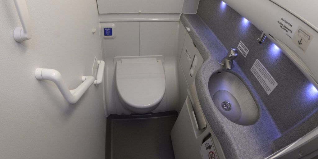 What really happens when you flush on an airplane toilet