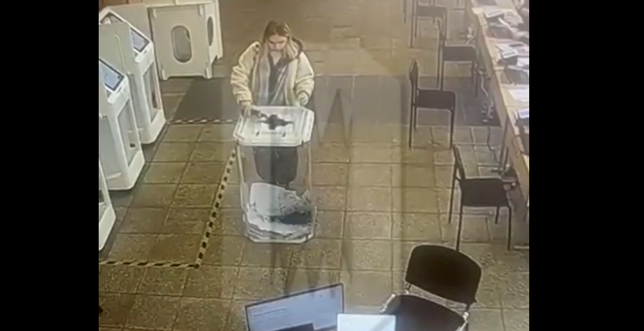 Video: Moscow Woman Faces Charges for Disrupting Election with Colored Dye Incident