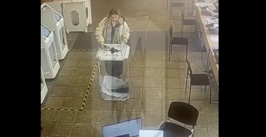 Video: Moscow Woman Faces Charges for Disrupting Election with Colored Dye Incident