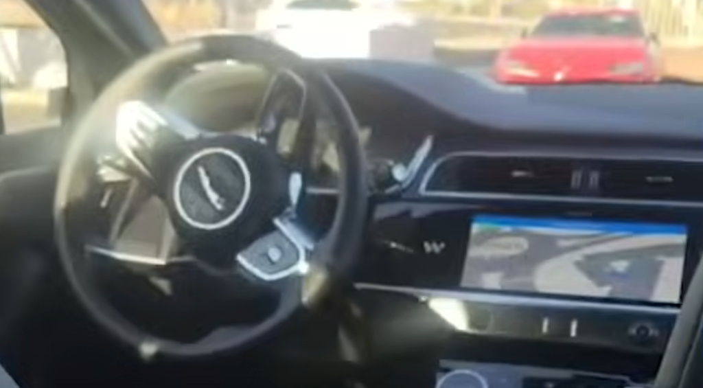 VIDEO: American Man Trapped in Autonomous Taxi as It Loops in Parking Lot