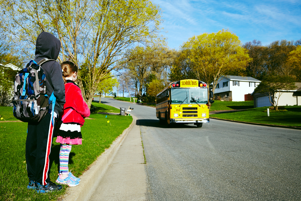 Can Give You a Fine: Passing a Stopped School Bus is Illegal