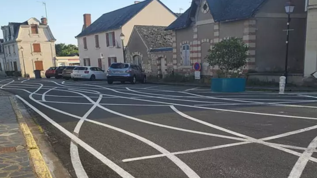French village gets creative with road markings to slow down speeding cars