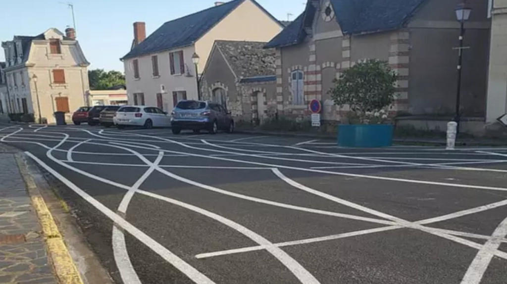 French village gets creative with road markings to slow down speeding cars