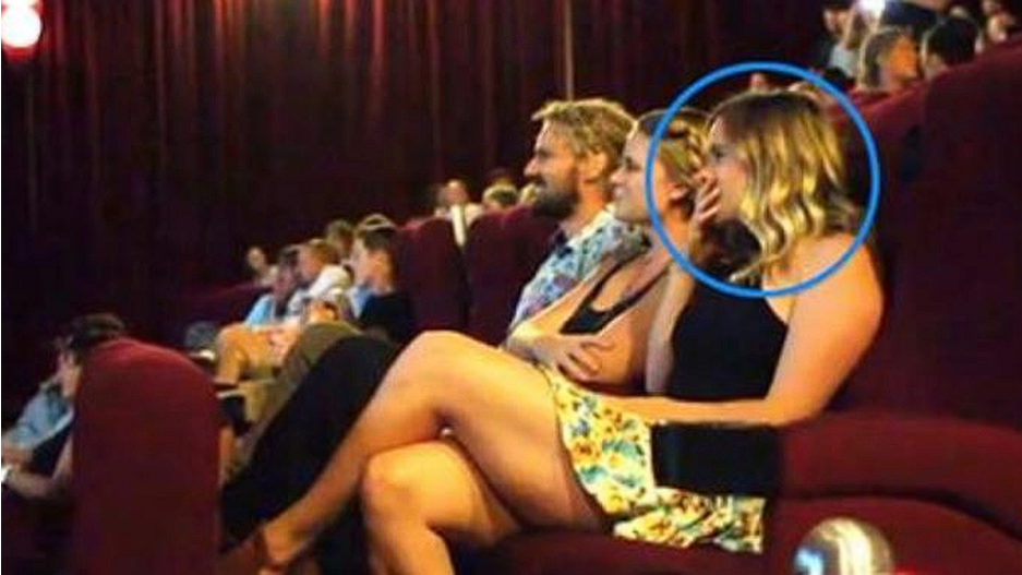 Woman gets the surprise of her life in a movie theater when the film turns out to be something else entirely