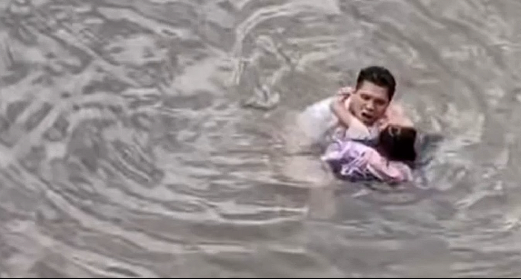 Brave citizen leaps into river to save girl from being swept away