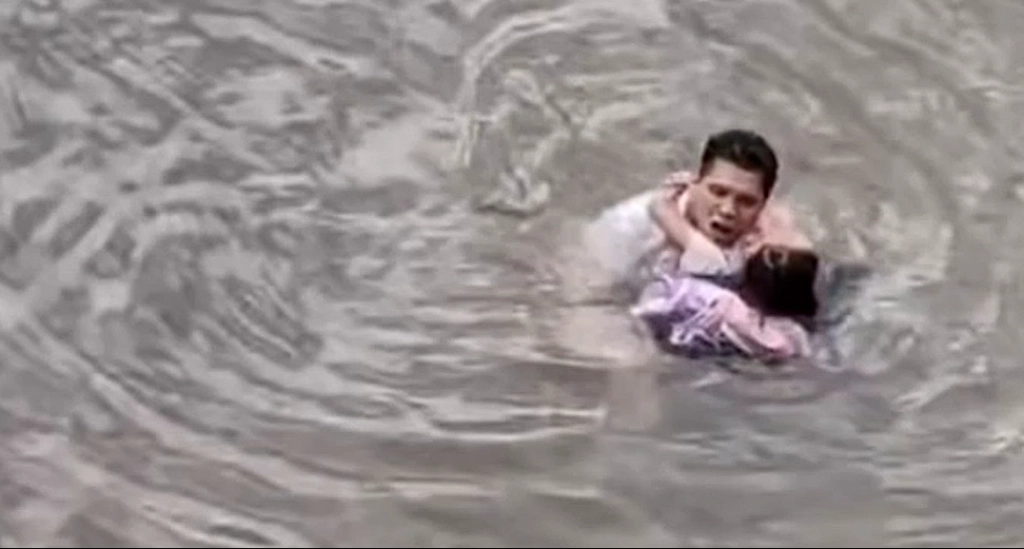 Brave citizen leaps into river to save girl from being swept away