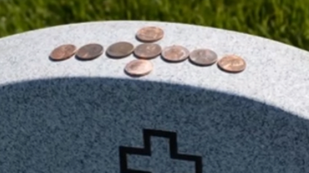Why people place coins on tombstones: You’ll reach for your wallet when you know