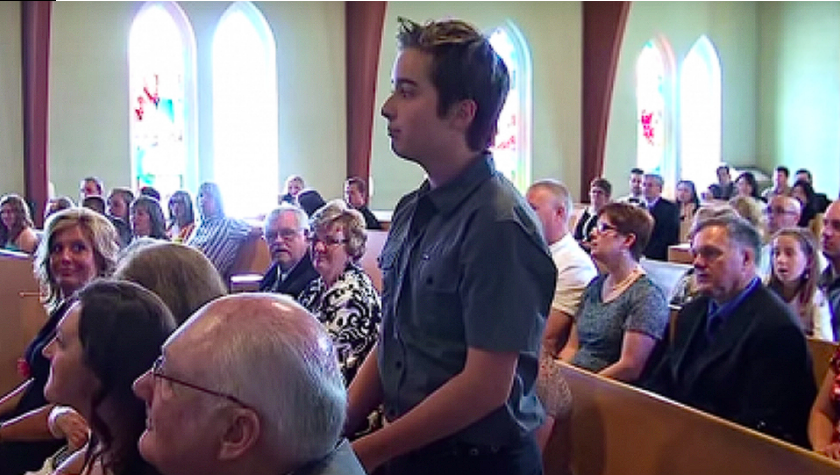 Boy stands up during wedding ceremony to give groom the surprise of his life