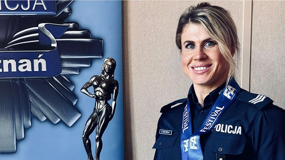 By day, she leads at the police department; by night, she competes in a bikini