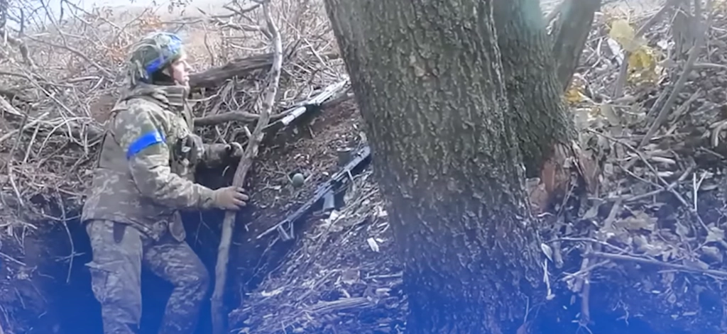 Female Ukrainian battle medic fights Russians and saves lives in brutal trench warfare video