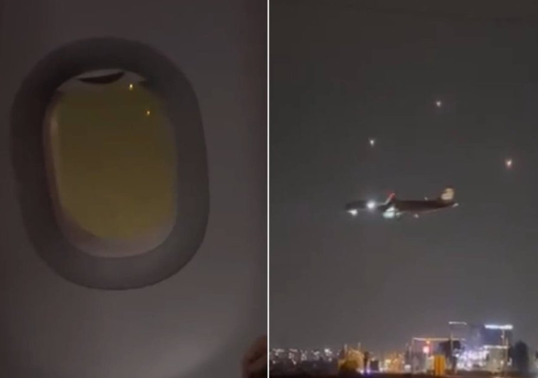 Watch passenger plane landing at Tel Aviv airport as Israeli missiles go against Hamas rockets