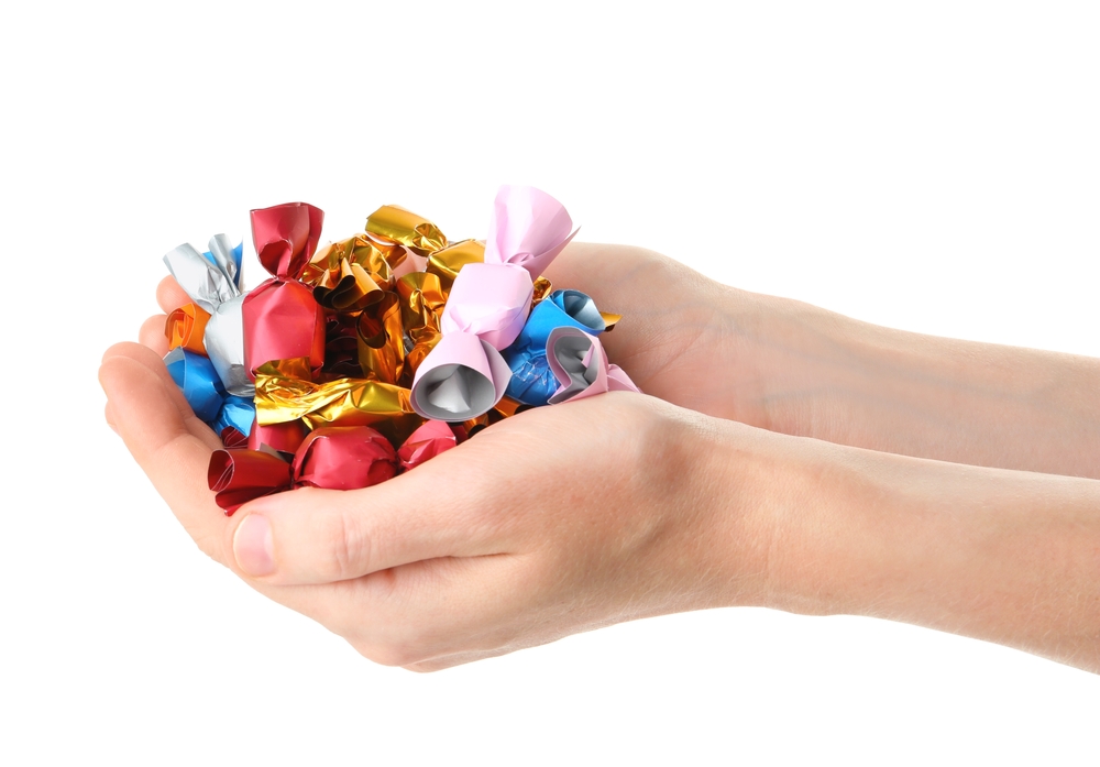 Why do Danish 9th graders throw caramels at each other on their last day of school